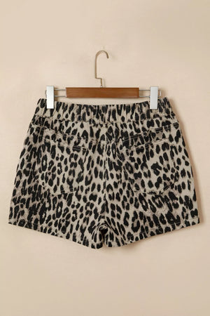 Denim shorts with leopard print and elastic waistband.