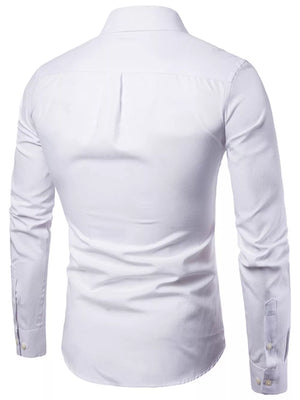 White cotton button-down shirt with long sleeves and buttoned cuffs.