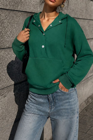 100% polyester Care instructions: Machine wash cold pullover hoodie in Dark Green with relaxed silhouette