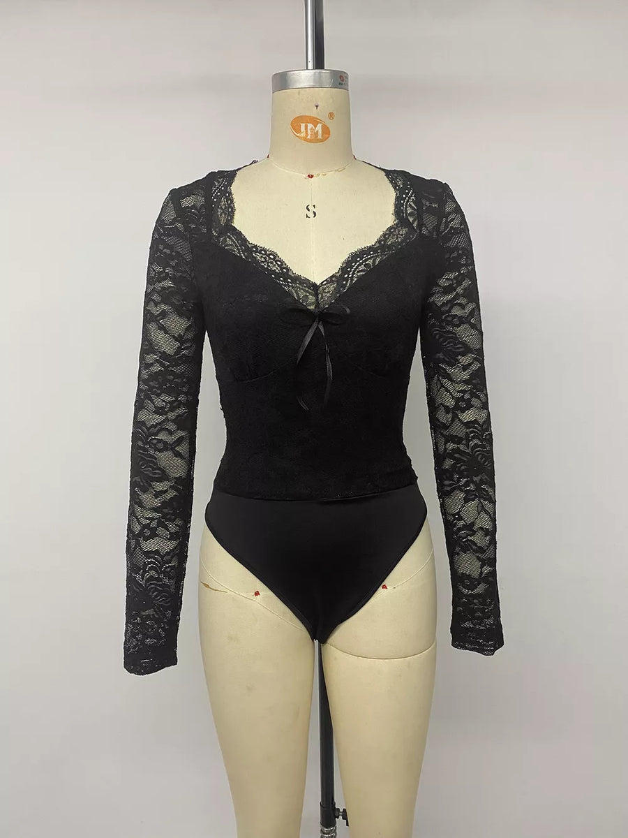 Black lace long sleeve bodysuit with sweetheart neckline and bow detail