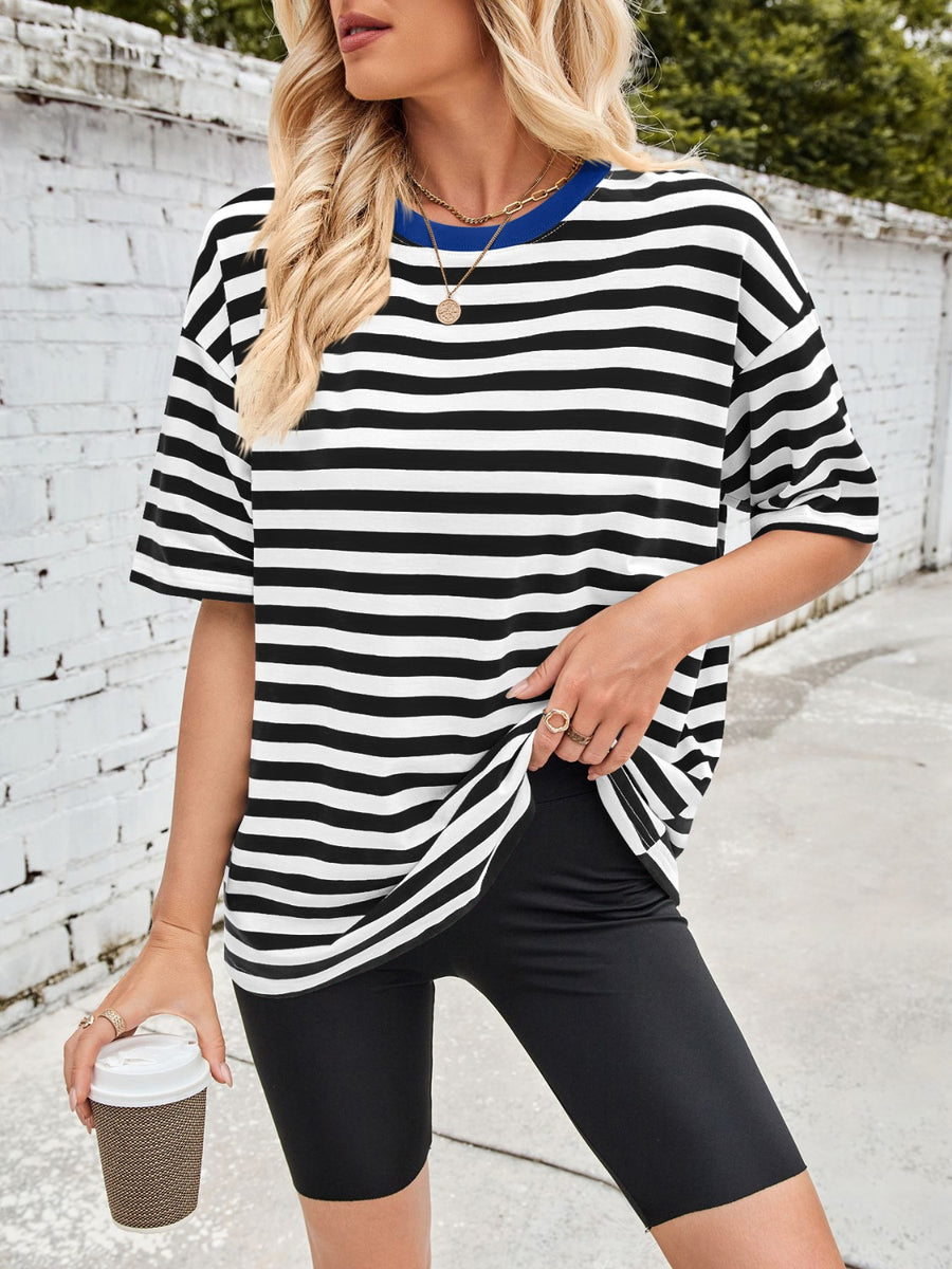 Relaxed fit t-shirt with black and white stripes and a blue contrast neck.