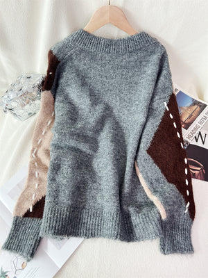 dark brown v-neck sweater with ribbed cuffs and long sleeve