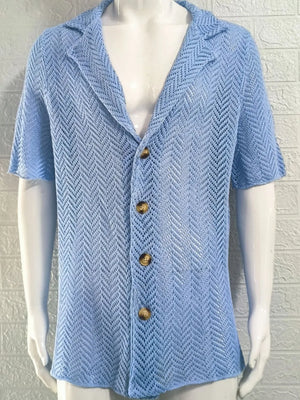 Light blue open-knit herringbone resort shirt with a collar and buttons.