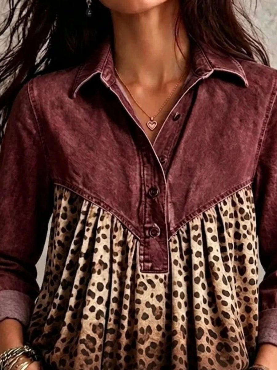 Black blouse featuring buttoned and leopard
