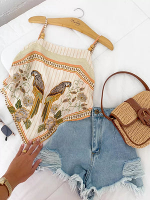 Embroidered parrot & floral cami top with adjustable beaded straps.
