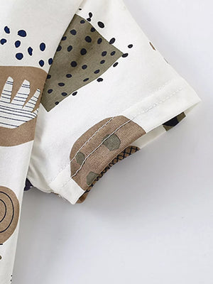 Toddler cotton tee with playful abstract animal print and short sleeves.