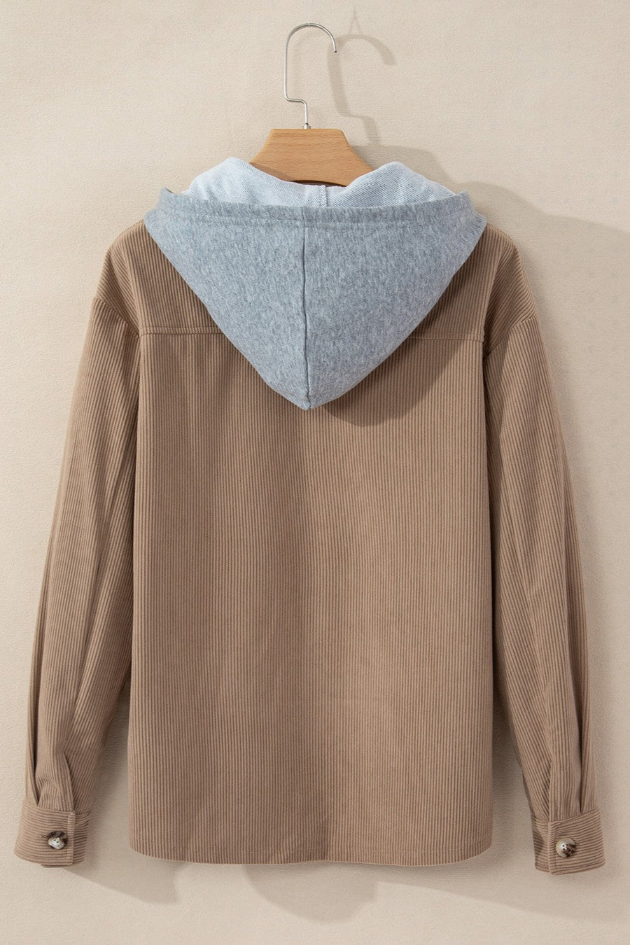 Corduroy shirt jacket in Mocha with contrast light gray hood and button cuffs.