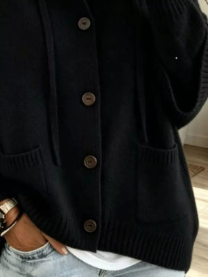 100% polyester Care instructions: Machine wash cold cardigan in Black with relaxed silhouette