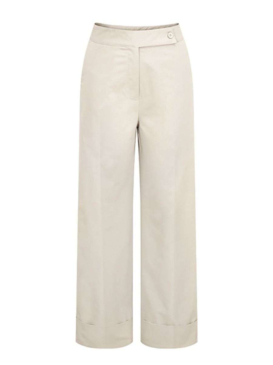 Beige wide-leg tailored trousers with cuffed hemline and button closure.