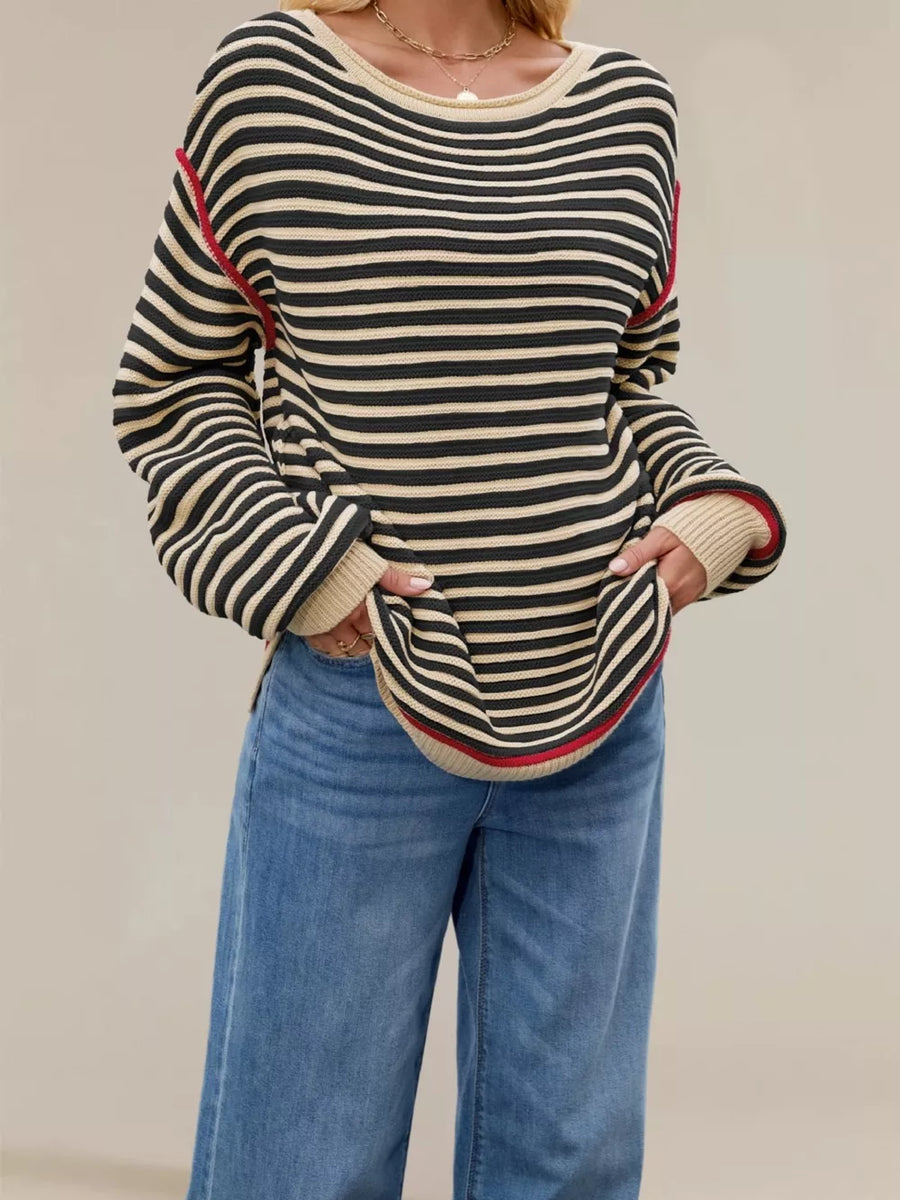 100% Acrylic Care instructions: Machine wash cold pullover sweater in Navy Blue with oversized silhouette