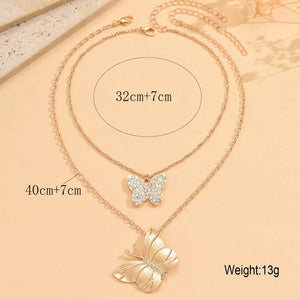 necklace in Gold with butterfly and layered
