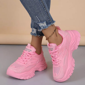 athletic shoes in pink featuring round toe and chunky platform fit