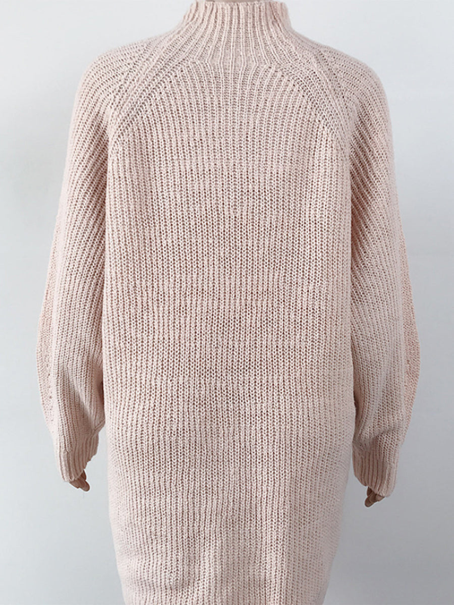 Ribbed knit cocoon turtleneck dress in blush pink with long sleeves and a relaxed fit.