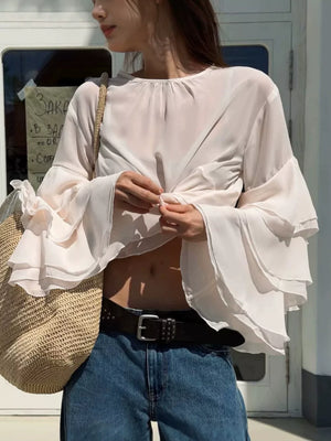 blouse in ivory featuring frill and relaxed fit