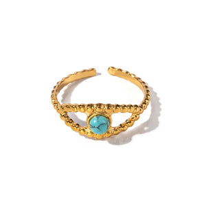 ring in turquoise with geometric and eye design