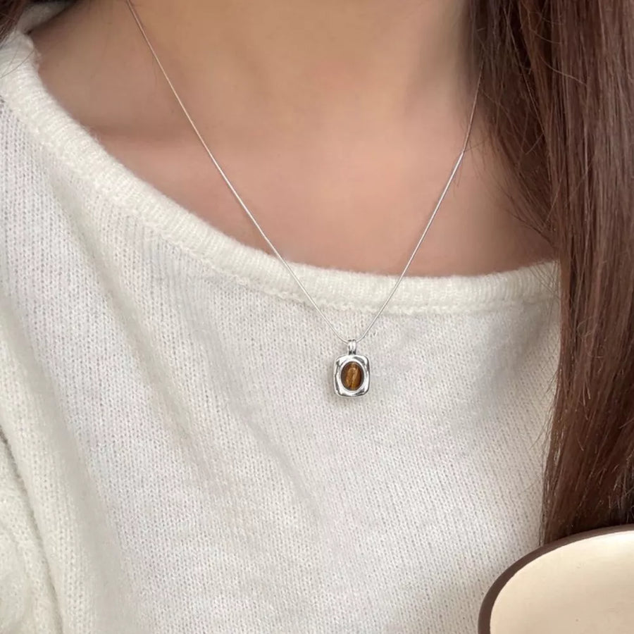 Tiger' necklace in brown with delicate silhouette