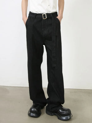 Black denim wide-leg trousers with a matching belt and silver buckle.