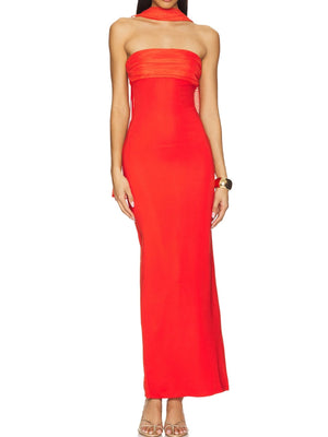 Red ruched strapless maxi dress with a bodycon fit and halter neckline detail.