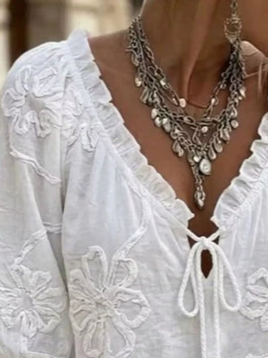 Black blouse with hip-length and tie