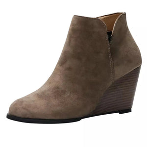 Khaki suede wedge ankle boots with V-cut shaft and stacked heel.