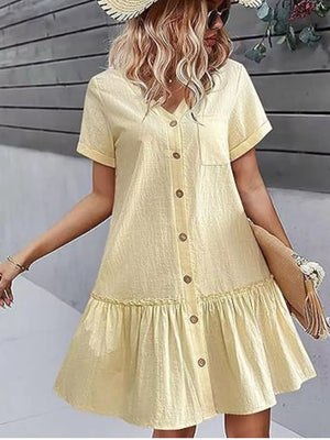 mini dress in pale yellow featuring buttoned and A-line fit