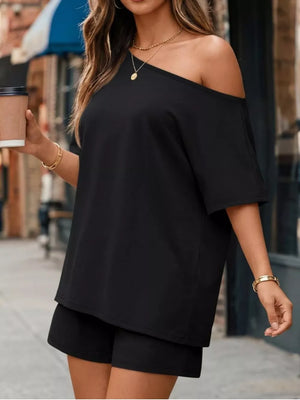 100% polyester Care instructions: Machine wash cold two-piece set in Black with relaxed silhouette