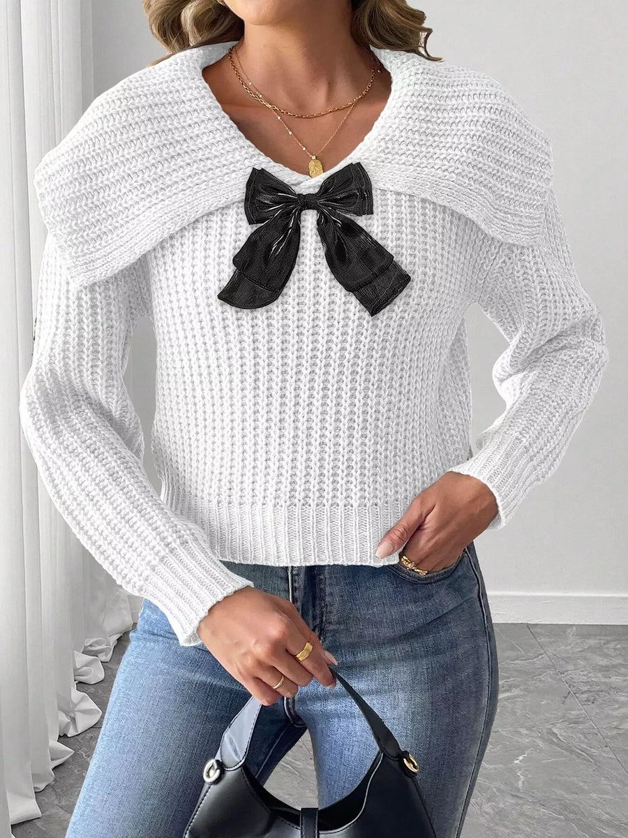 100% polyester Care instructions: Machine wash cold pullover sweater in black with regular silhouette
