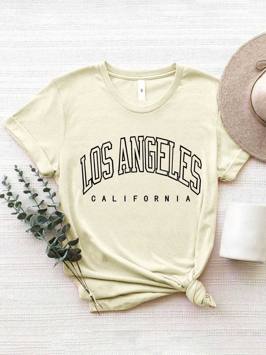 Cream graphic t-shirt with Los Angeles California text, 100% polyester, short sleeves