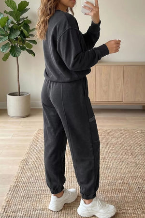 50% polyester, 50% cotton Care instructions: Machine wash cold lounge set in Dark Gray with relaxed silhouette