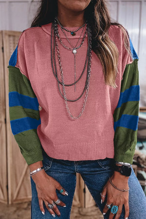 olive green pullover sweater featuring exposed seam and color-block