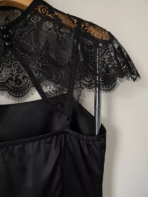 mini dress in Black with square neck and spaghetti strap