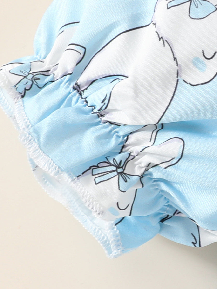 Sky blue baby dress with bunny print and ruffled trim.