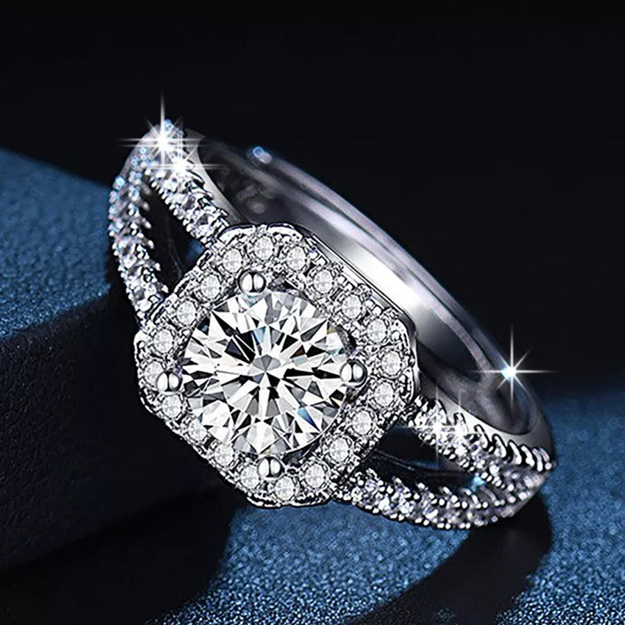 925 sterling silver,Moissanite Carat weight: 1ct Care instructions: Avoid wearin ring in clear with classic silhouette