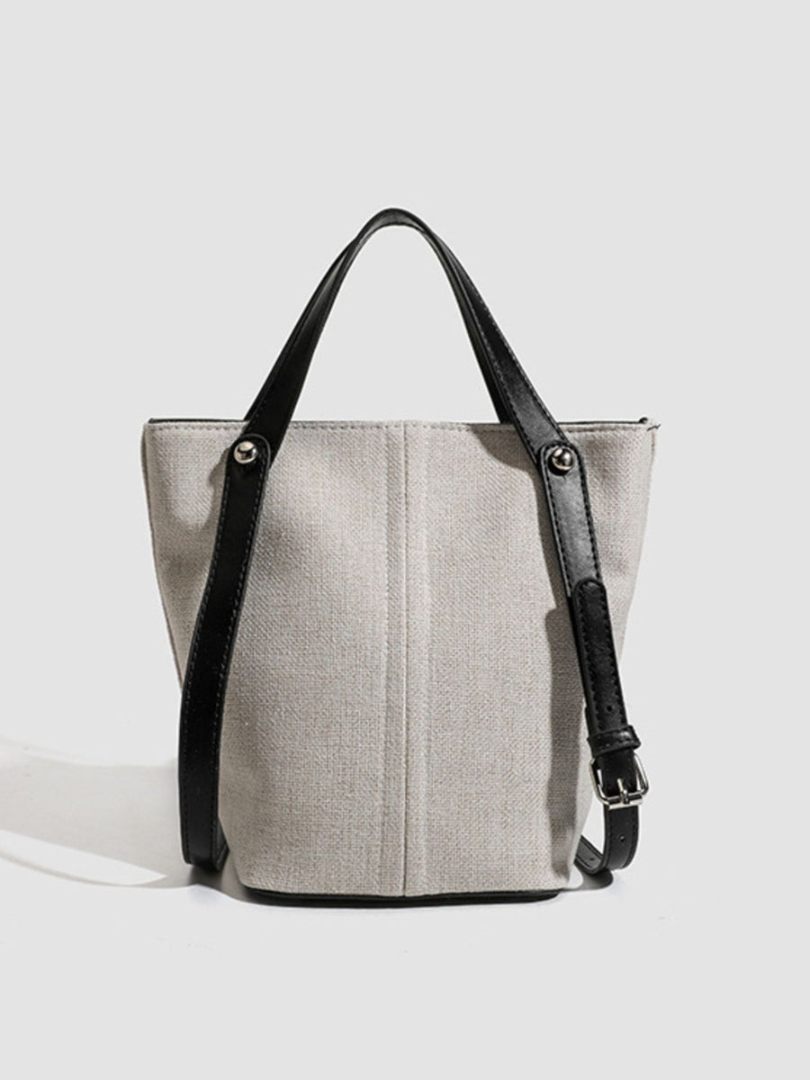 handbag in Light Gray with adjustable strap and small