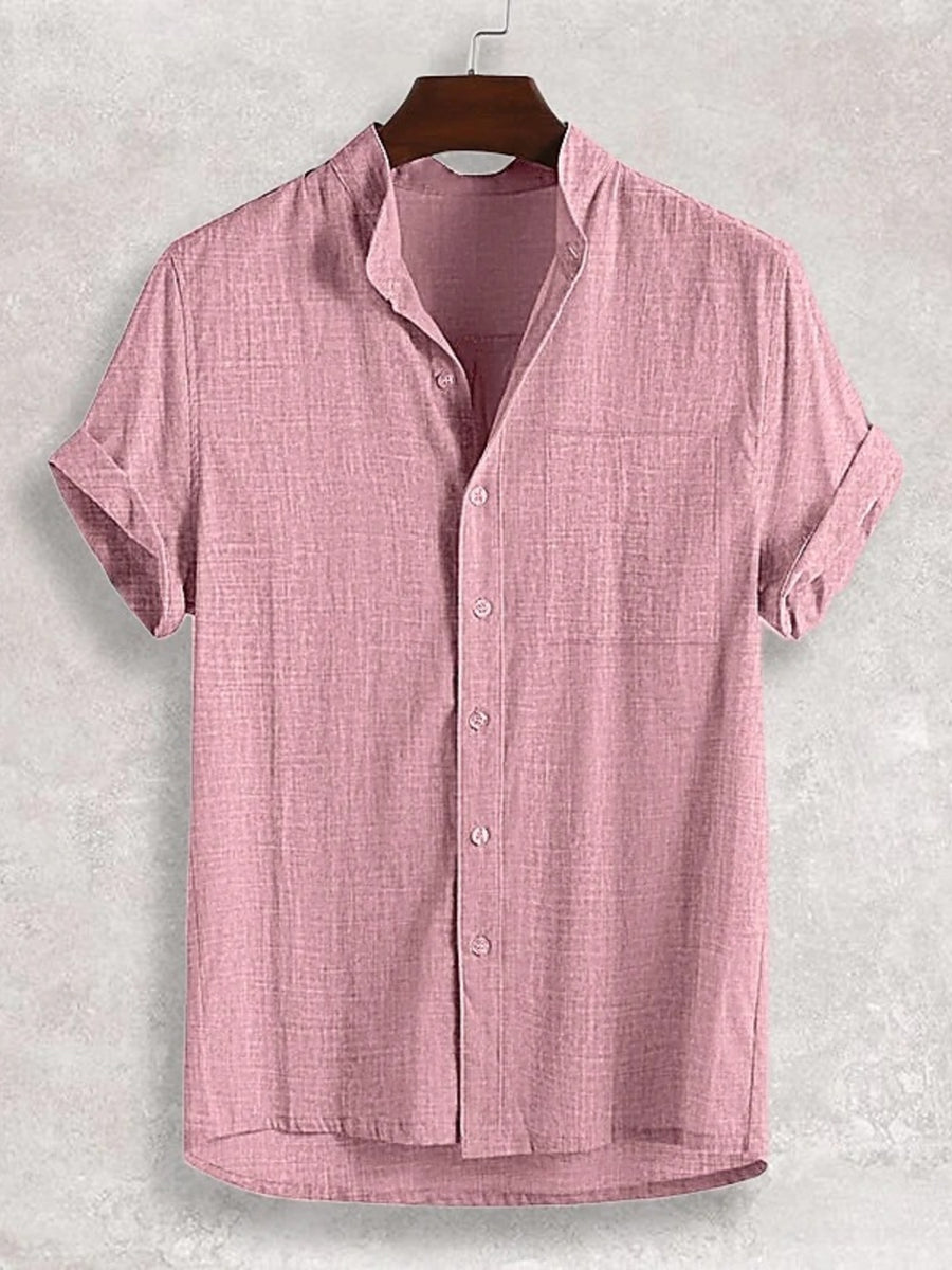 Pink textured band collar casual shirt with short sleeves and button front.