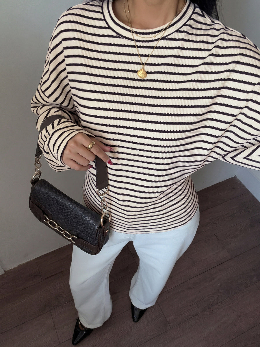 beige t-shirt featuring stretch and striped