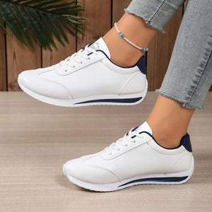 Dark Blue sneakers featuring lace-up closure and color-block