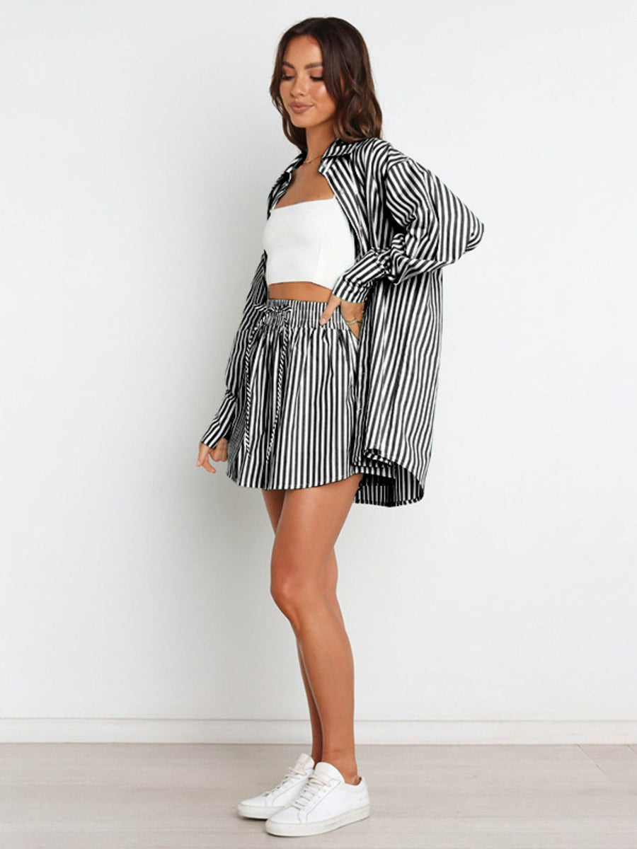 Oversized black and white stripe shirting set with a button-up shirt and drawstring shorts.