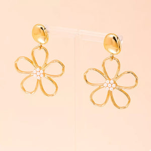 silver earrings featuring drop design and floral