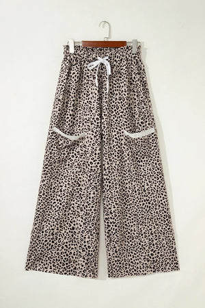 wide-leg pants featuring leopard-print in tan with 100% polyester Care instructions: Machine wash cold texture
