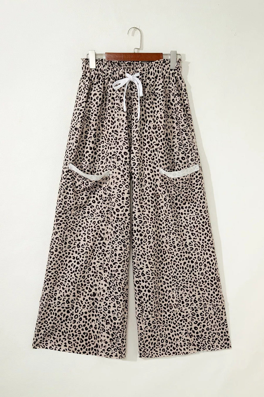 wide-leg pants featuring leopard-print in tan with 100% polyester Care instructions: Machine wash cold texture