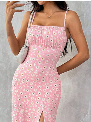 Dusty Pink floral spaghetti strap midi dress with ruched bust and side slit.