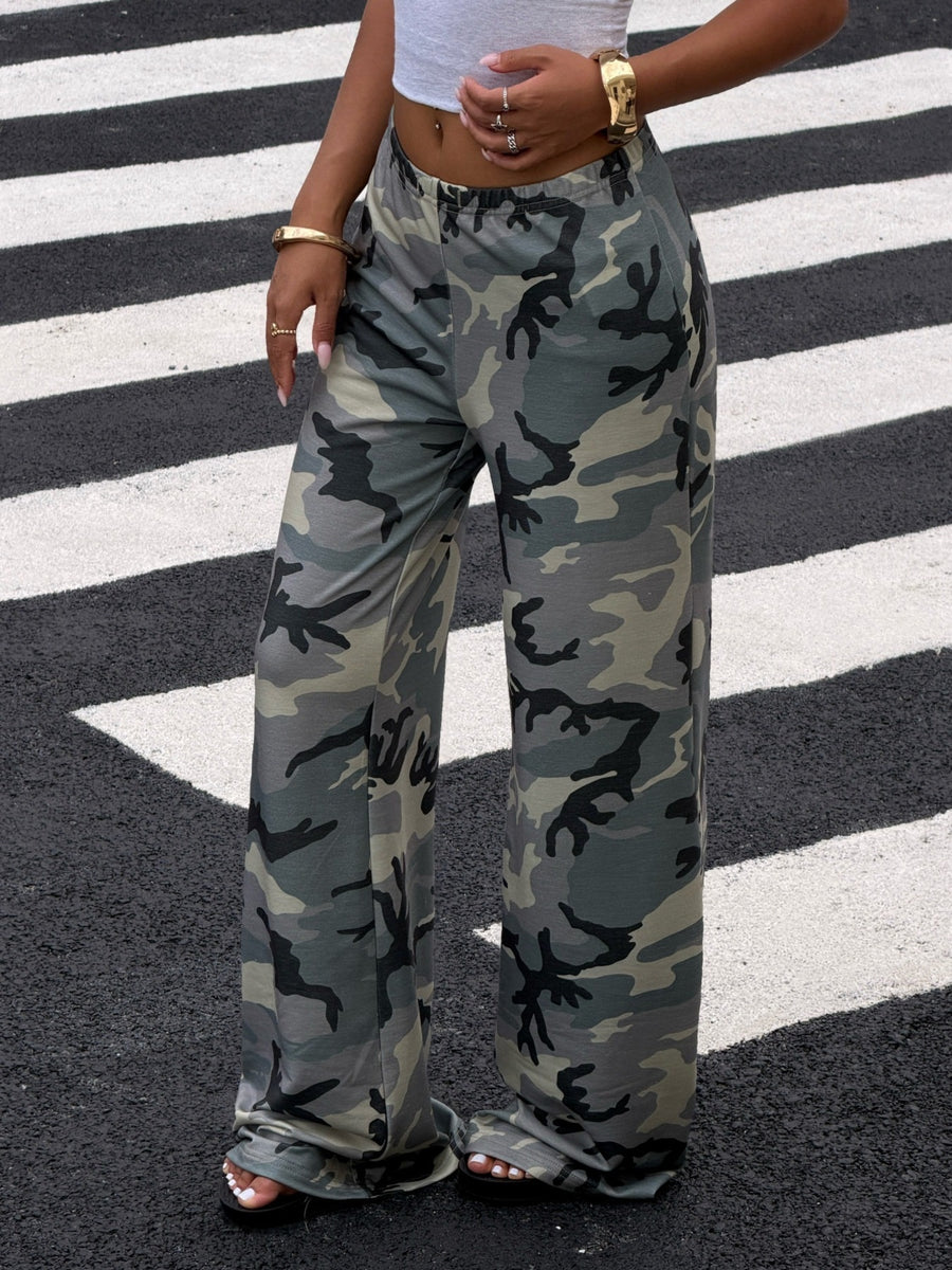 95% polyester, 5% elastane Care instructions: Machine wash cold wide-leg pants in light beige with loose silhouette