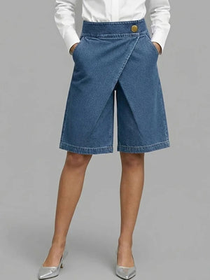 denim shorts in medium blue featuring buttoned and wide-leg fit