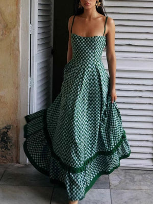 Green checkered maxi dress with spaghetti straps and tiered skirt