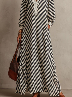 100% polyester Care instructions: Machine wash cold maxi dress in Light Blue with A-line silhouette