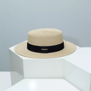 Beige straw boater hat with black band and gold detail
