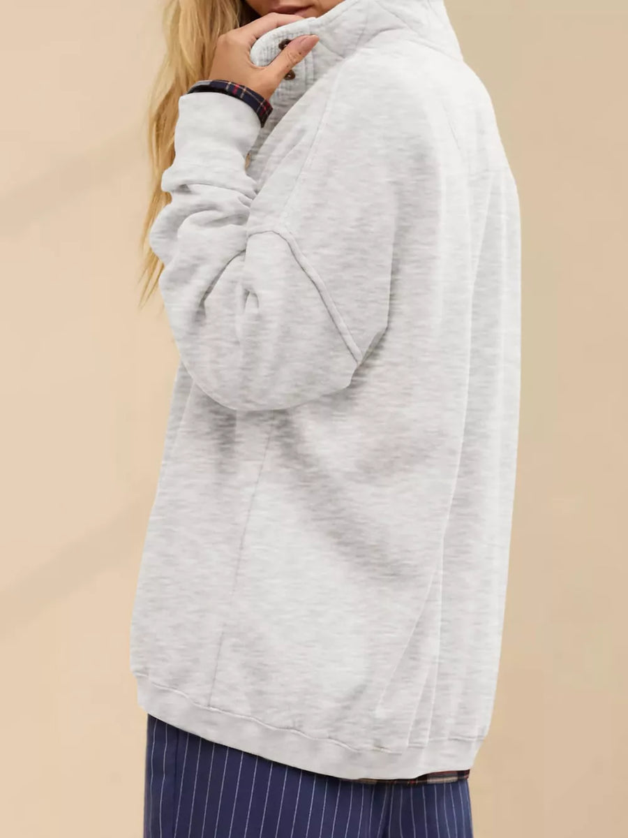 65% polyester, 30% viscose, 5% elastane Care instructions: Machine wash cold sweatshirt in Sky Blue with relaxed silhouette