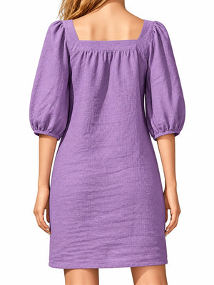 mini dress in Green with square neck and puff sleeve
