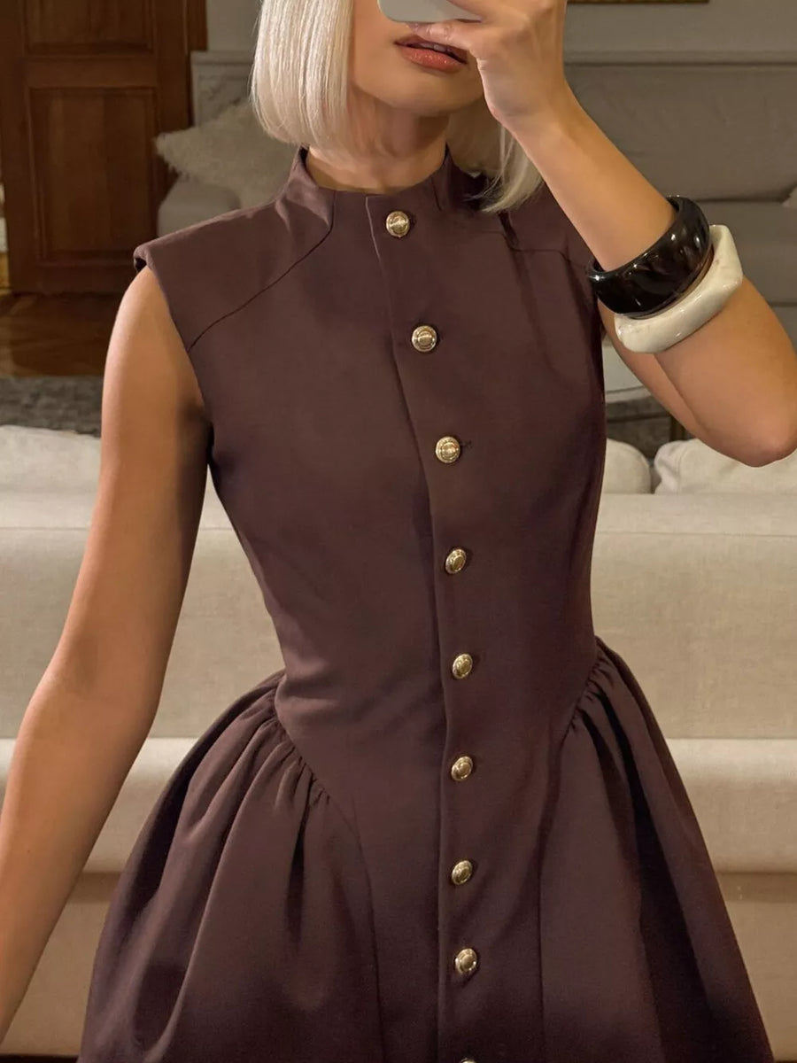 dark brown mini dress with gold buttons and sleeveless